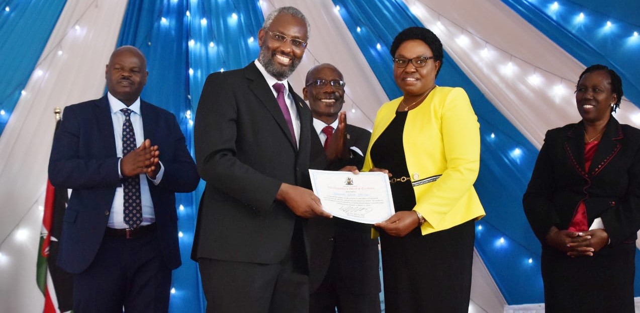 VICE CHANCELLOR PROF. STEPHEN KIAMA PHD Awards Director Dr. Lucy Muhia on Behalf of University Health Services, For demonstrating the core values of Care and Team work through offering a people-focused, responsive service.