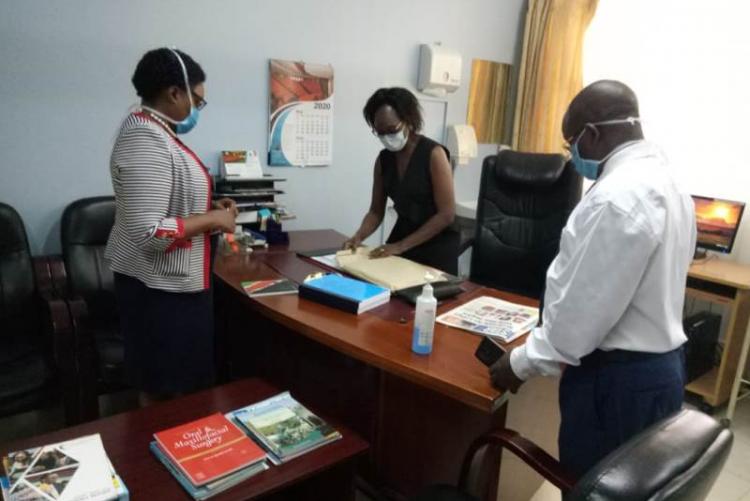 Far left Incoming CMO DR. Muhia, Outgoing CMO DR Asimba and Admin Mr. Kinyanki