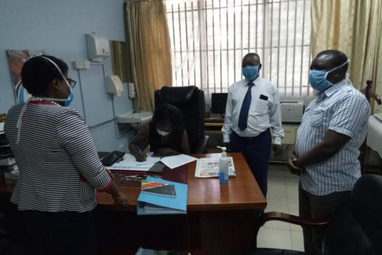 Handing over Ceremony to incoming CMO DR MUHIA by outgoing CMO Dr. Asimba witnessed by UHS Bursar Mr. Otiende and Admin. Mr. Kinyanki